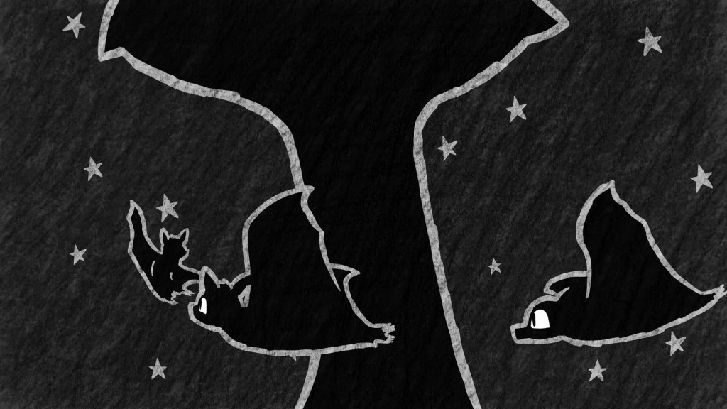 Three bats flying around tree.